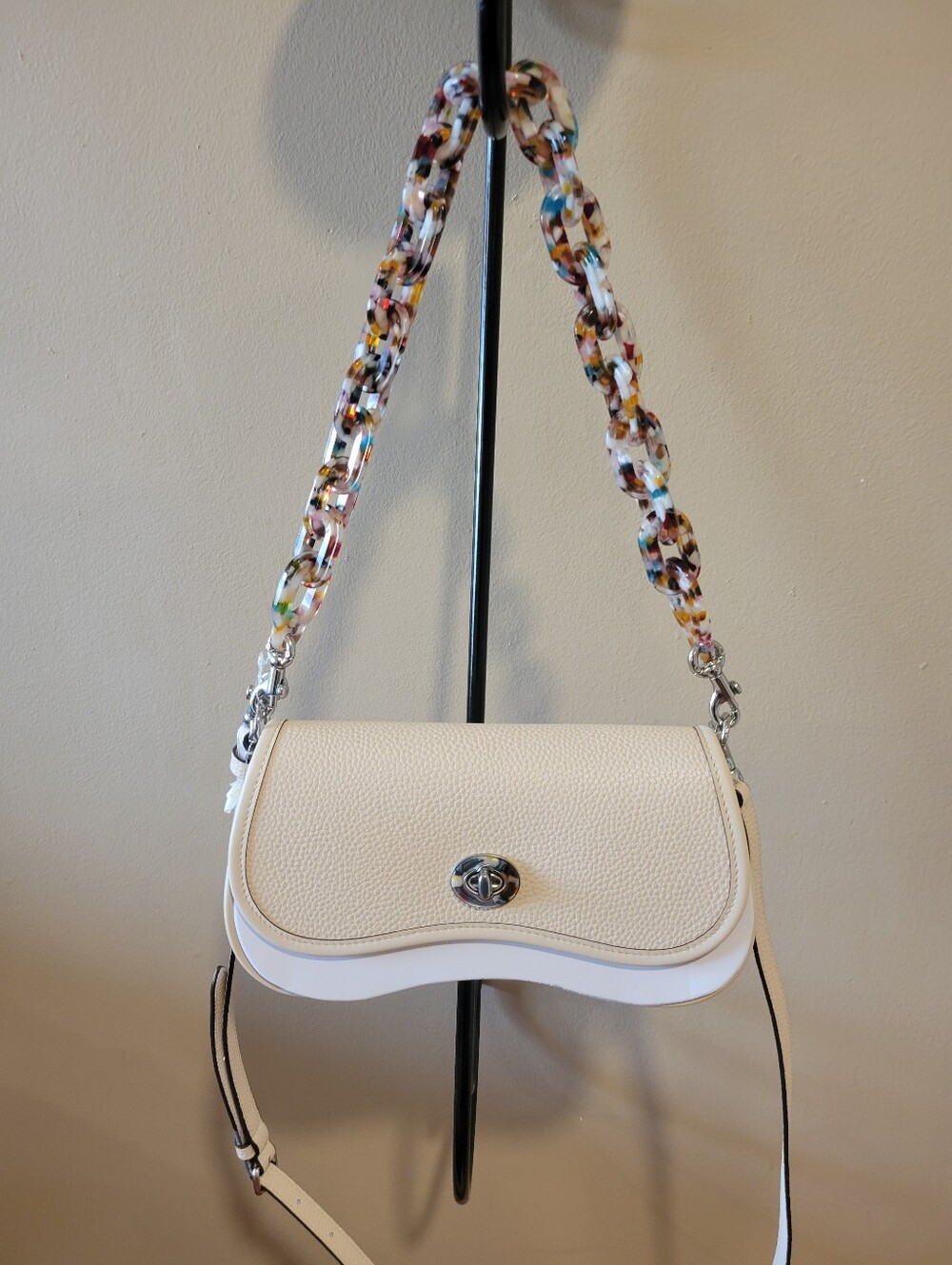Coachtopia Wavy Dinky Chic Cream Shoulder Bag with Multicolor Chain Strap.